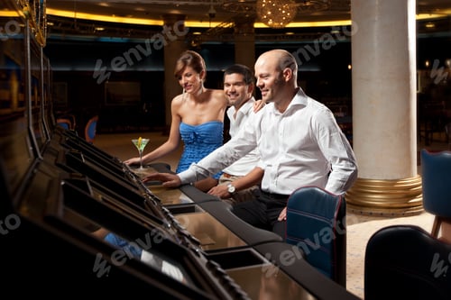 Preview: happy adults formal dressed gambling in casino