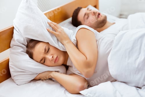 Preview: Unhappy Girlfriend Trying To Sleep Near Snorting Boyfriend Indoor