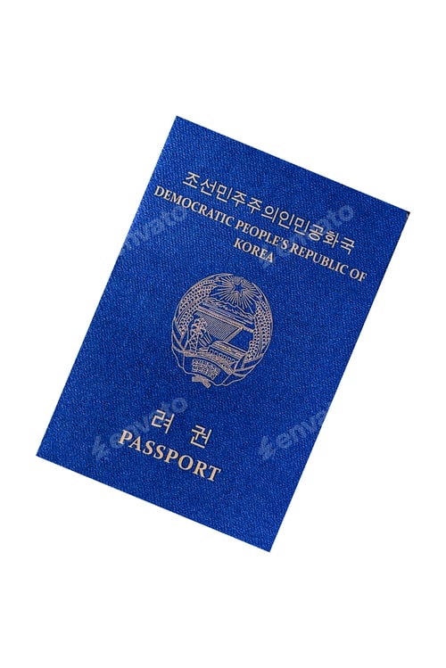 Preview: International passport of a citizen of North Korea on a suitcase