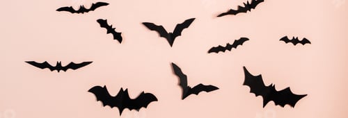 Preview: Happy Halloween. Bats on pink pastel background.