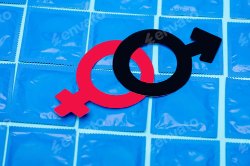 Preview: gender symbols on condoms isolated on blue