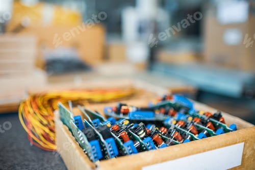 Preview: Close-up electric green embedded microcircuits in production