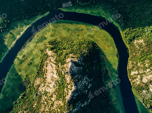 Preview: Crnojevica river flows around the green mountain
