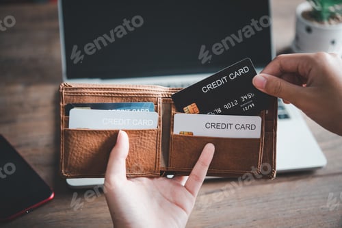Preview: Close up hands holding credit card out of the wallet, Online payment for online shopping