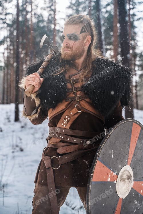 Preview: Norse Warrior Poised with Axe and Shield