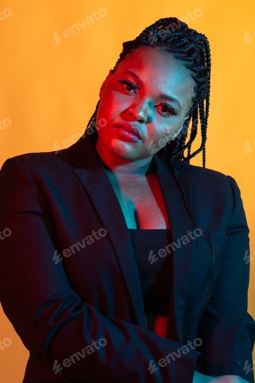 Preview: Beauty portrait of attractive african american woman with big afro and glamour makeup