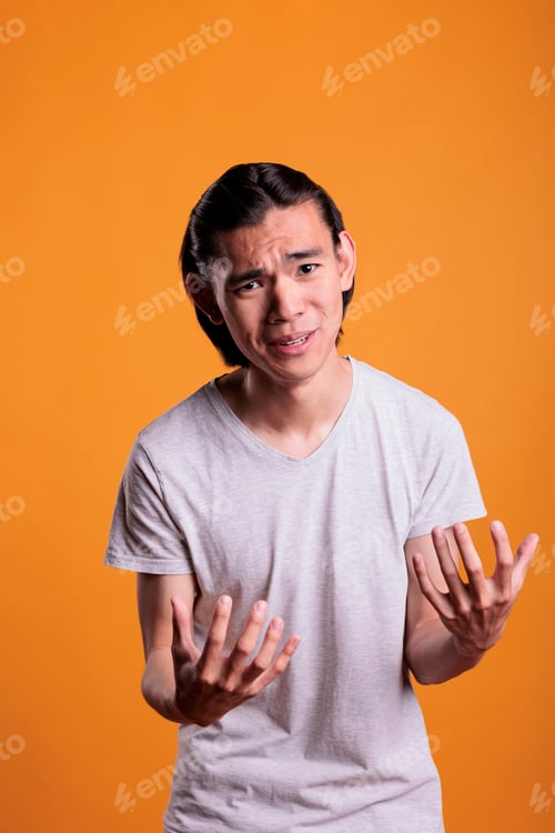 Preview: Crying young man begging, stretching hands out