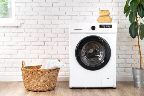 Preview: Washing machine and basket in a laundry room