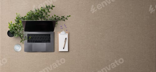 Preview: Flat lay top view office desk working space with laptop on brown background. Copy space.