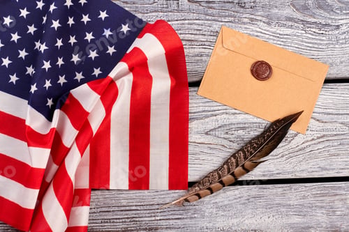 Preview: American flag, envelope and feather.