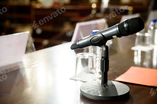 Preview: Microphone in conference room to communicate to the audience a business speech.