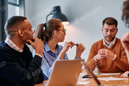Preview: In the vibrant ambiance of a modern startup office, a diverse team of business professionals engage