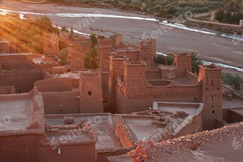 Preview: Ancient city near river in desert with sunshine