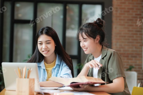 Preview: Young asian students campus helps friend catching up and learning.