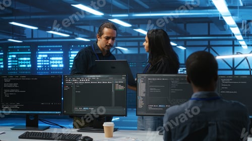 Preview: Diverse colleagues doing brainstorming, discussing ways to fix servers