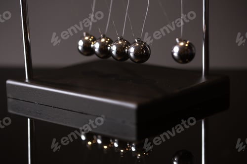Preview: Newton cradle representing momentum