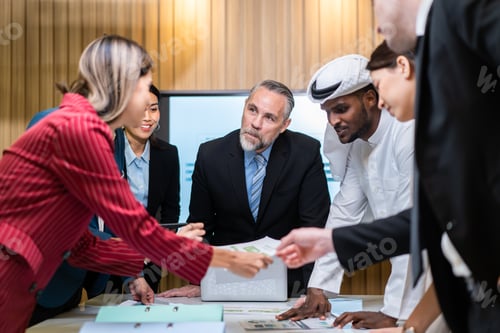 Preview: Group of multi-Ethnic businessman and businesswoman working in office.