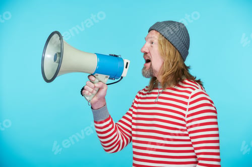 Preview: Man using megaphone to announce information