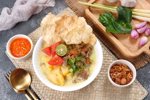 Preview: Soto Betawi. Traditional beef and offal soup from Betawi, Jakarta.