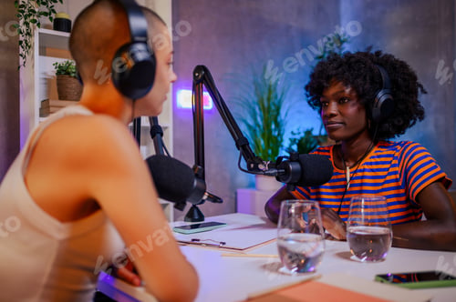 Preview: A serious interracial host is interviewing a famous influencer on her podcast.