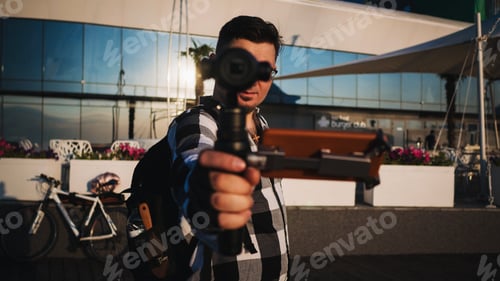 Preview: Man using his portable action camera