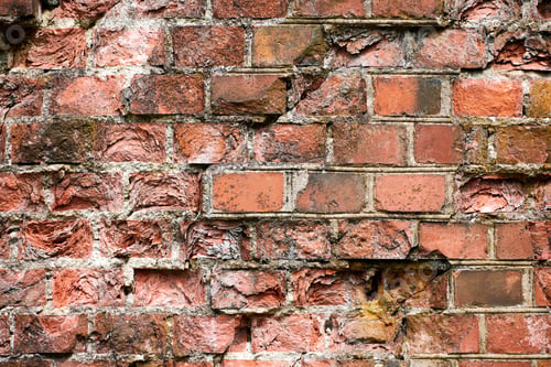 Preview: Red brick wall of old building, red brick texture, reliable brickwork masonry with bricklayer