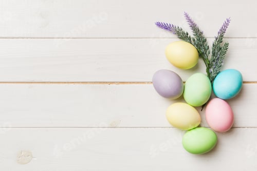 Preview: holiday preparation Multi colors Easter eggs on colored background . Pastel color Easter eggs.