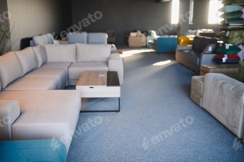 Preview: Modern furniture showroom displaying sofas and home decor