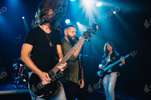 Preview: Rock band performing live on stage with passionate musicians