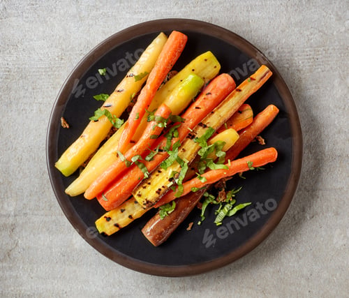Preview: plate of grilled colorful carrots