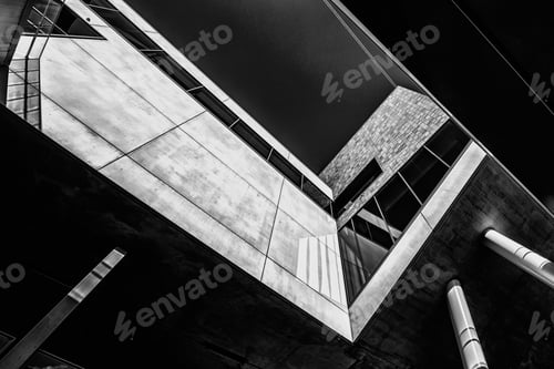Preview: Greyscale low angle shot of a building with cool design
