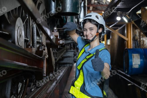 Preview: Portrait of Engineer train Inspect the train's diesel engine, railway track in depot of train