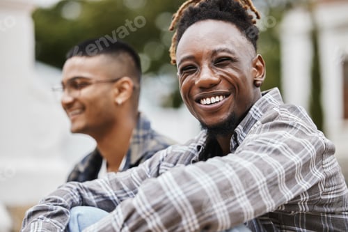 Preview: Smiling but were stressed. Shot of two young men on campus.