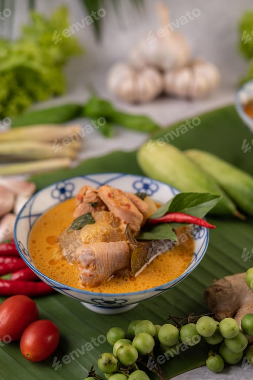 Preview: Chicken curry with Wax gourd in a ceramic cup.