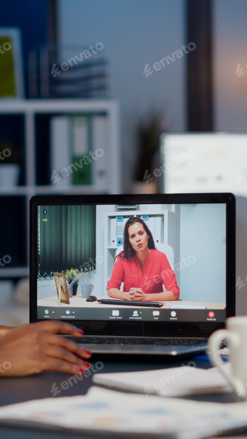 Preview: African businesswoman discussing with remotely woman partner