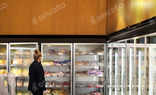 Preview: Supermarket Shopping, Face Mask And Gloves,Woman Choosing Frozen Food From A Supermarket Freezer
