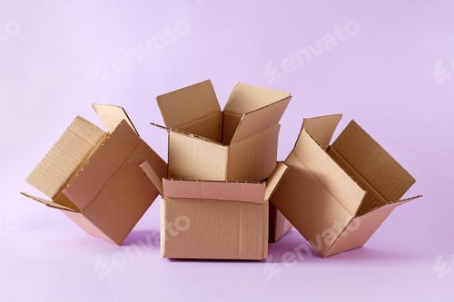 Preview: Pile of open cardboard boxes for storing and shipping items and parcels.