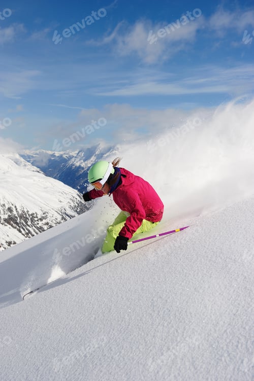 Preview: Woman skiing downhill
