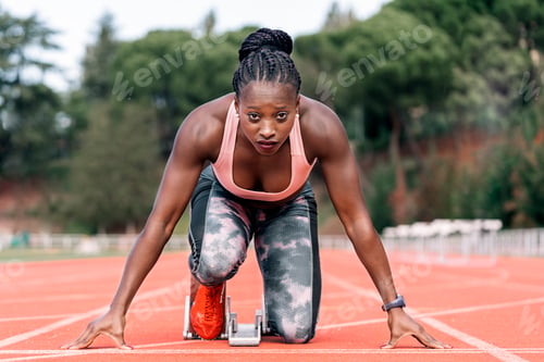 Preview: Athlete sprinter in starting position