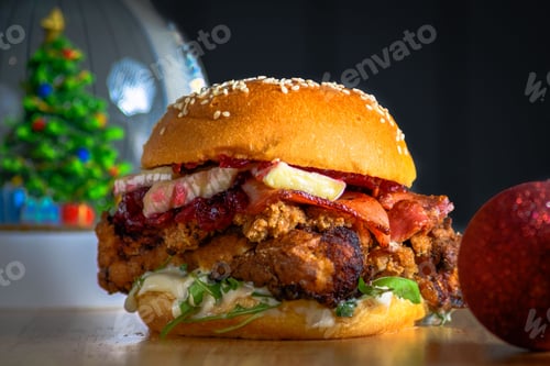 Preview: Closeup of a chicken, brie, and cranberry burger on a table - a concept of a Christmas Burger