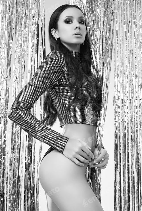 Preview: Portrait Of Gorgeous Elegant Hispanic Brunette Woman With Perfect Body In Luxurious Silver Sequin