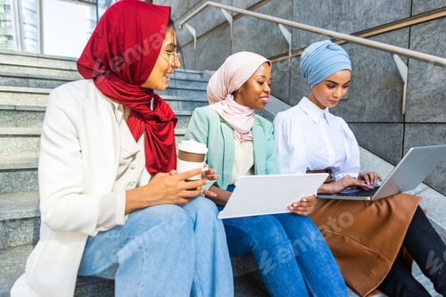 Preview: Beautiful muslim girl wearing hijab bonding outdoors