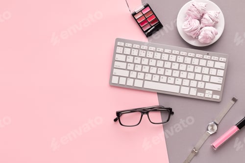 Preview: Working space with keyboard on pink background