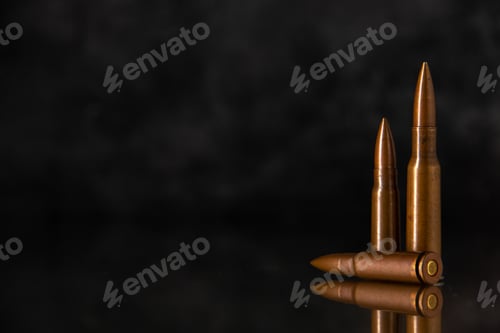 Preview: brown bullets on a dark background shooting gun tank death war
