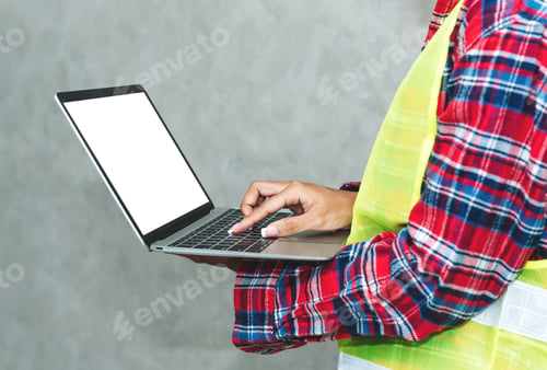 Preview: Young black woman civil engineer ,architecture worker using laptop for work.