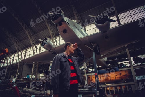 Preview: A man in airplanes museum.