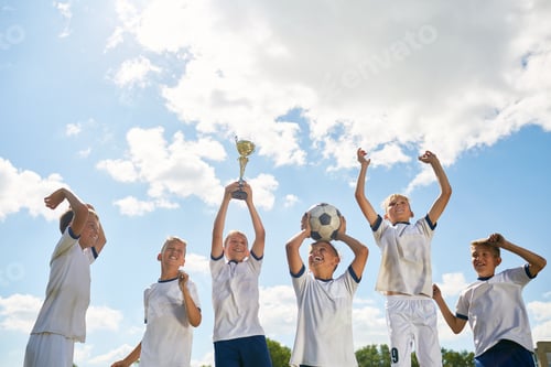 Preview: Junior Football Team Celebrating Victory