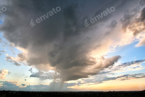 Preview: Landscape of dark clouds forming on stormy sky during thunderstorm.