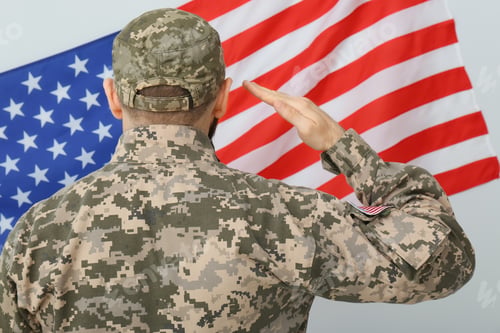 Preview: Soldier in uniform and United states of America flag on white background, back view