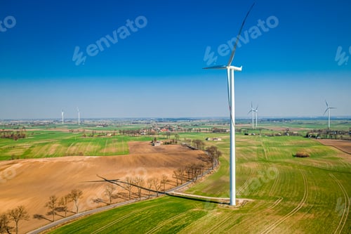Preview: Wind turbines on field. Alternative energy in Poland. Aerial view
